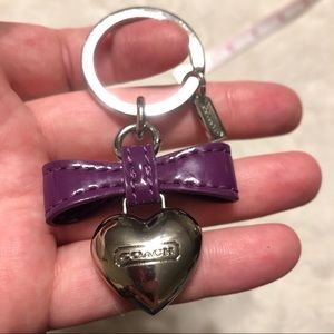 coach purple and silver puffed bow/heart keychain